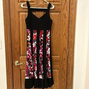 Fashque polyester Lycra blend flow, sleeveless strapping dress size small